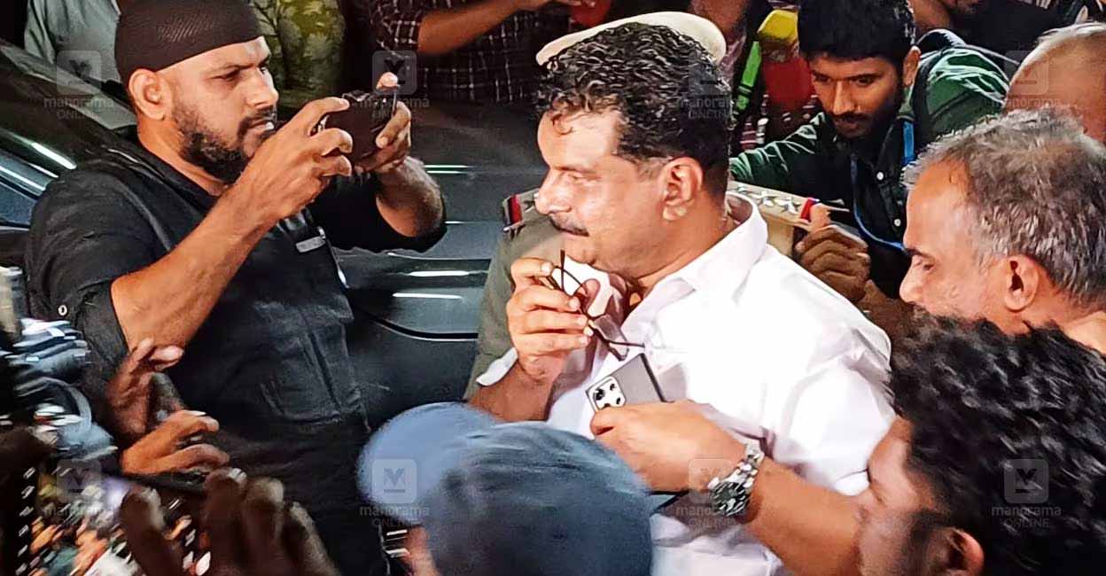 PV Anvar is being taken into custody. Photo: Manorama