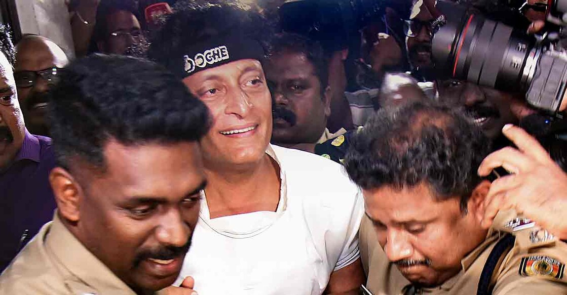 Police personnel arrest businessman Bobby Chemmanur in connection with a sexual harassment complaint filed by Malayalam actress Honey Rose, in Kochi, Kerala, Wednesday, Jan. 8, 2025. Photo: PTI