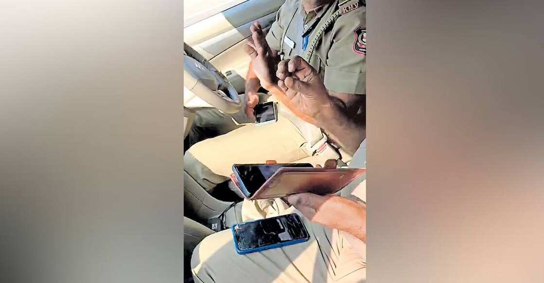 The incident took place on Saturday afternoon at Oyoor Junction when an enforcement vehicle of the Kollam MVD unit, which was actively inspecting other vehicles for violations in the area, was caught in violation itself. Photo: Screengrab. 