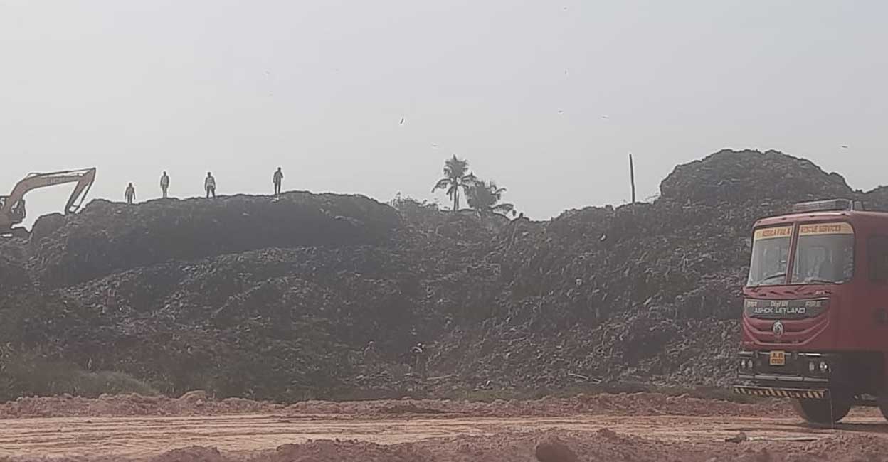 Three units of Fire and Rescue Services personnel contained the fire broke out at Brahmapuram waste dumping site on Friday. Photo: Special arrangement