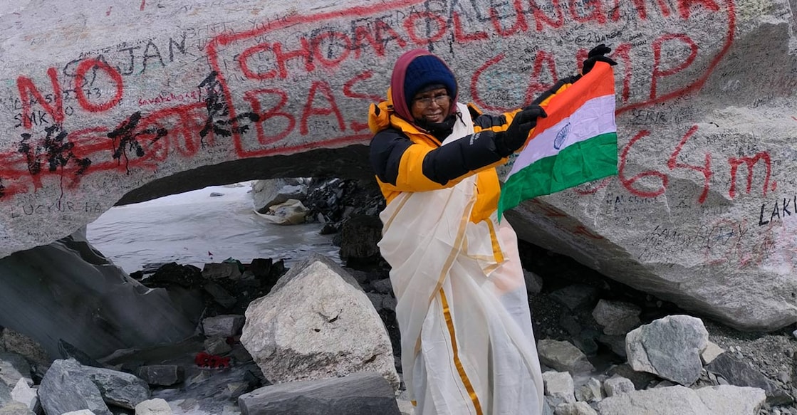 Standing at an altitude of 5,364 meters, she wrapped herself in a traditional kasavu saree over her trekking suit, waved the Indian flag, and captured the moment in photos and videos. Photos: Special arrangement. 