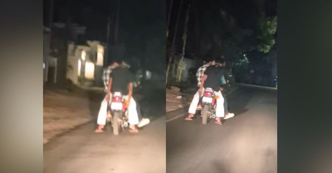 The footage shows the gang coercing the victim onto a bike while wielding the weapon. Photo: Special Arrangement