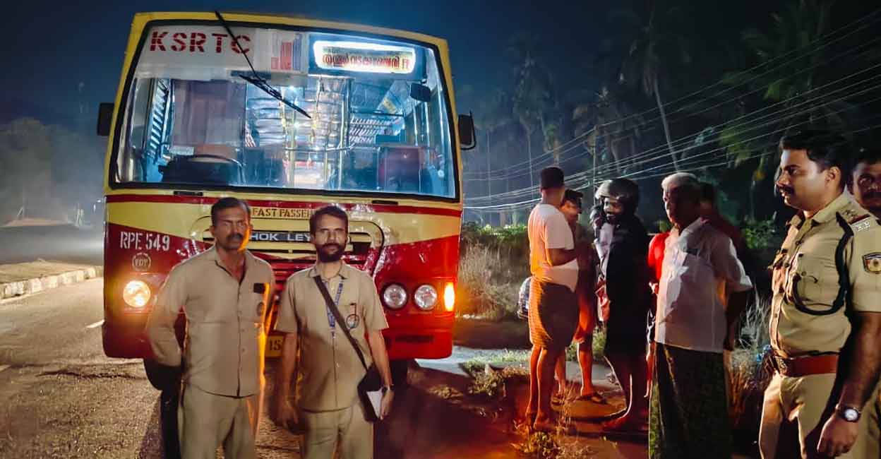 Driver C K Vinod from Kizhakkanchery and conductor Sivadasan from Kannambra were attacked by occupants of a car that had stopped in front of their bus. Photo: Special arrangement
