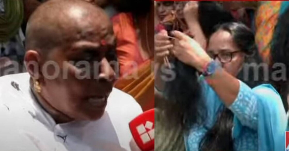 ASHA workers cut hair in front of secretariat in Thiruvananthapuram. Photo: Screengrab/ Manorama News