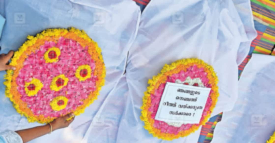 psc-rank-list-protestors Candidates stage a symbolic protest by placing wreaths on themselves. Photo: Manorama Online