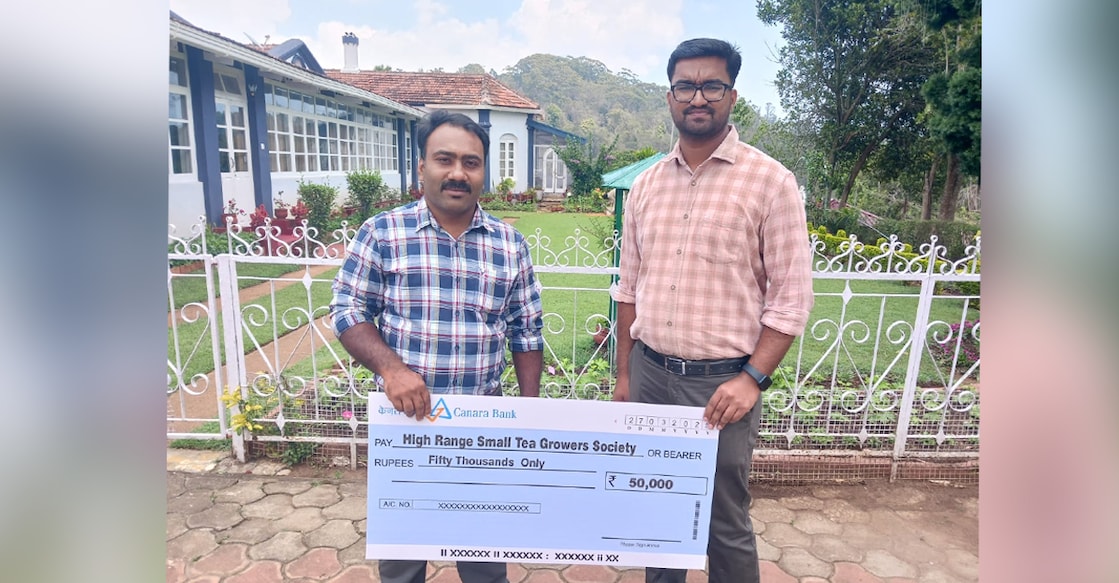 Shyjo Sebastian (left ) and Jerin Joseph (right) after receiving the award at the United Planters Assiciation of South India venue in Coonoor. Photo: Special Arrangement