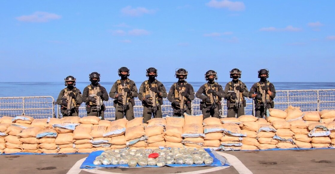 Officials of INS Tarkash, a frontline frigate of the Indian Navy, after an operation in which 2500 kg of narcotics were seized in the Western Indian Ocean. Photo: Navy/PRO via PTI