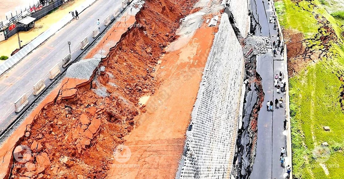 kooriyadu-1 An image of the collapse, showing cracks all over the road and across the paddy field. Photo: Manorama.
