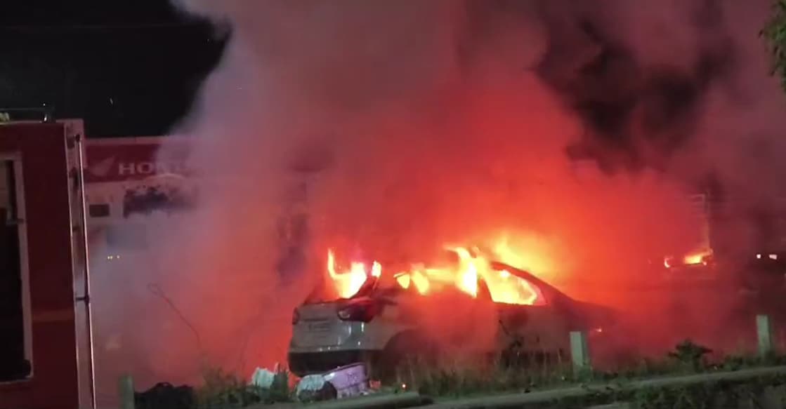 A screengrab showing the car engulfed in fire. 
