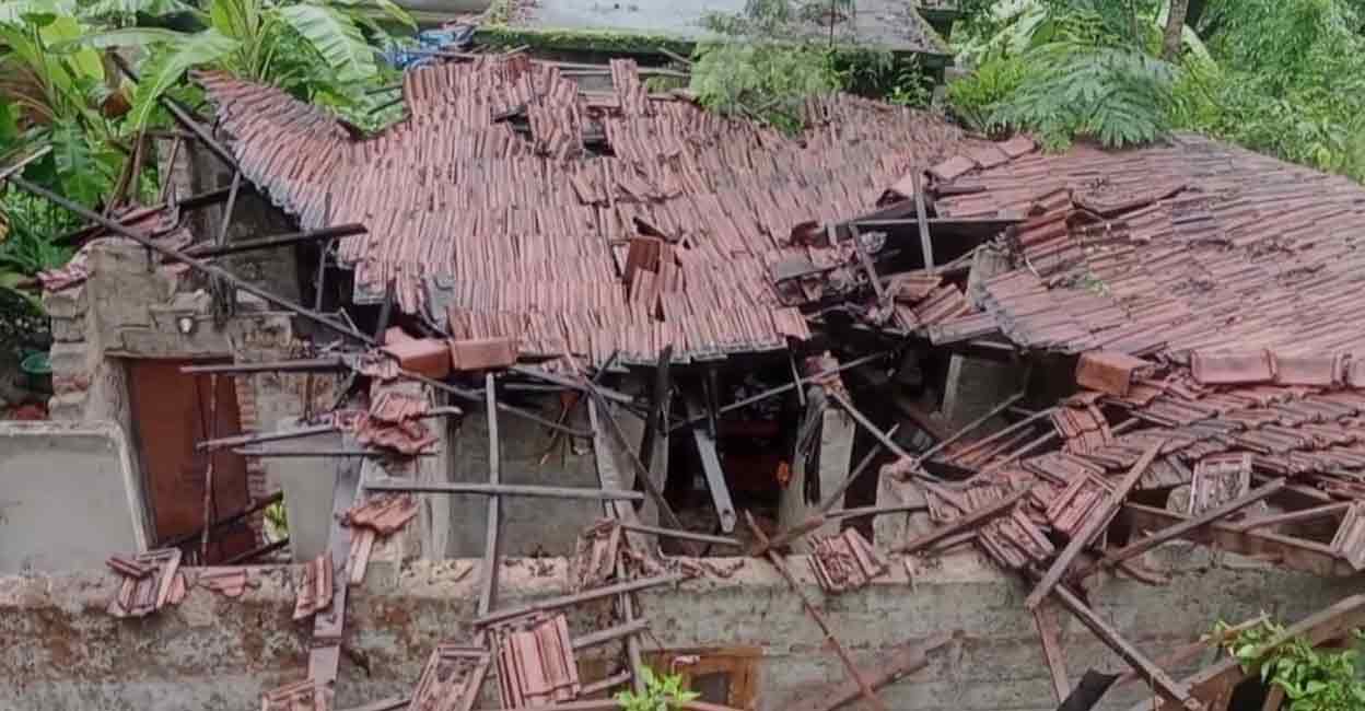 A house was damaged by falling trees in Wadakkanchery, Thrissur. Photo: Special arrangement