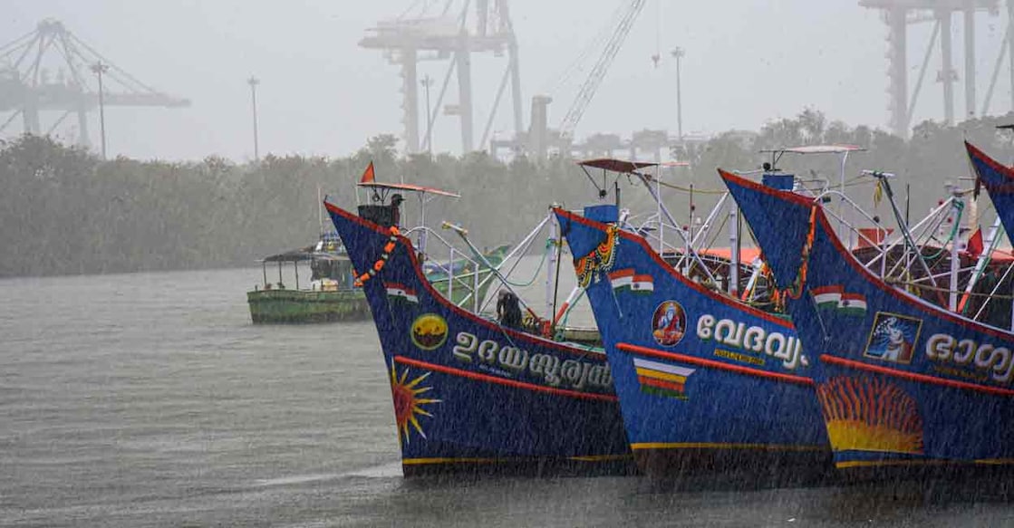 Boats anchored amid a heavy pre-monsoon shower in Kochi, Friday, May 23, 2025. Photo: PTI