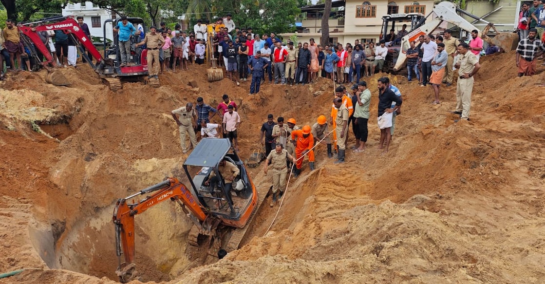 Fire and Rescue personnel conduct operations to rescue workers trapped inside the collapsed well. Photo: Special Arrangement.