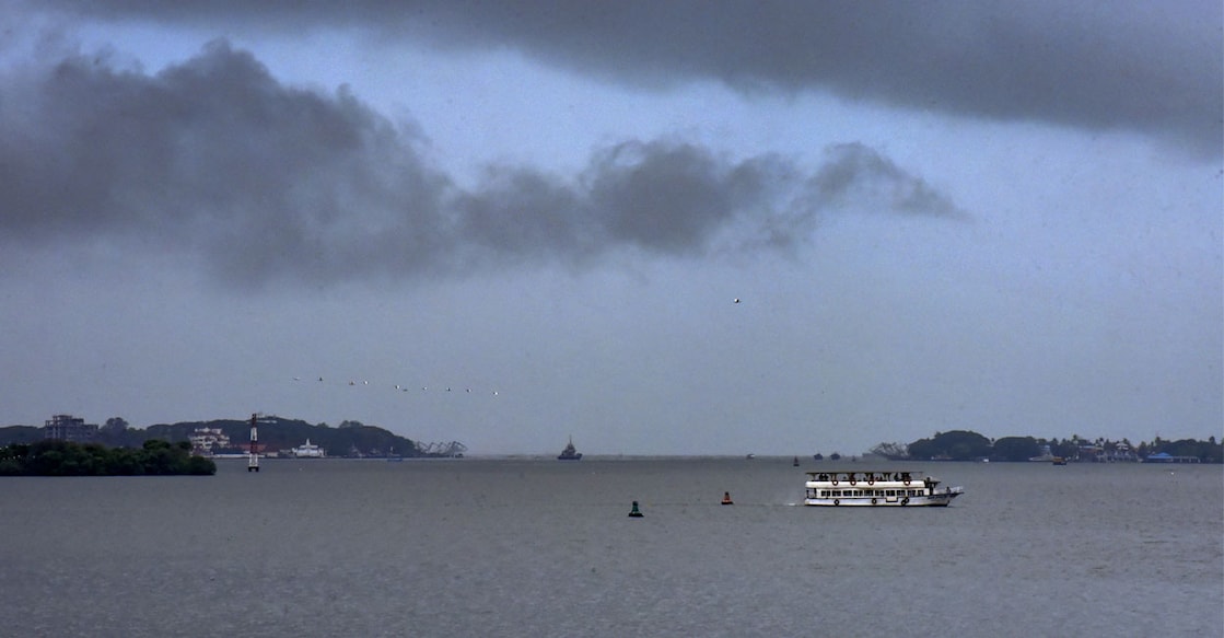 kochi-monsoon Dark clouds cover the skyline in Kochi. Photo: PTI
