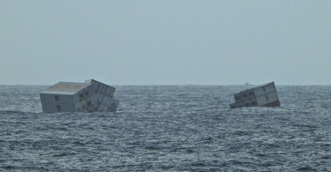 This photograph taken and released on May 25, 2025 by the Indian Defence Public Relations Office (PRO) of Mumbai, shows Liberian-flagged ship's containers after it capsized off India's southern coast of Kerala. Photo: PTI.