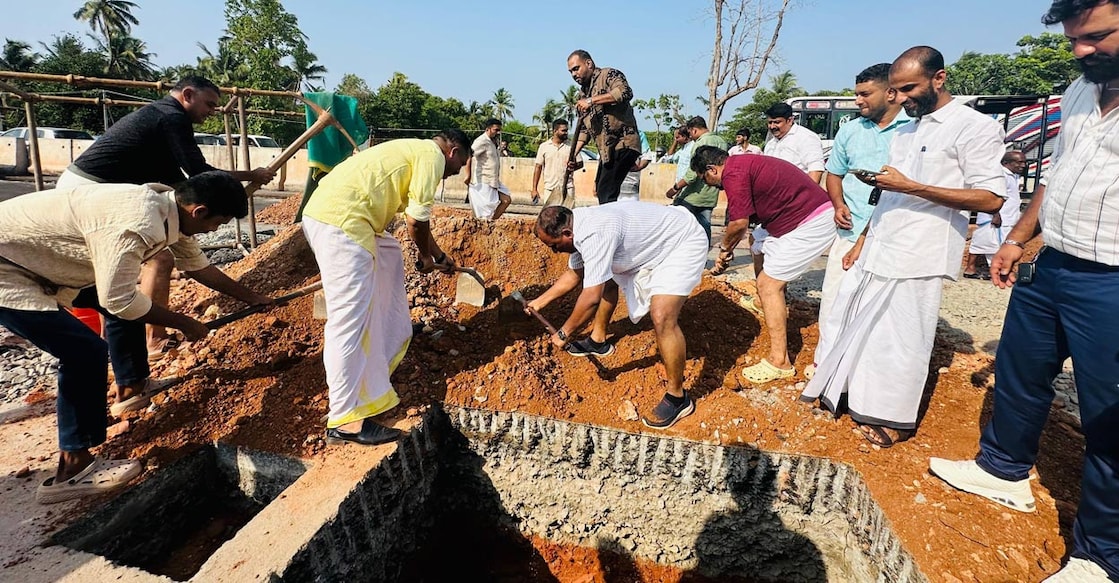 nhai-kasaragod Protesters, led by Kasaragod's lawmakers, filled in the pits dug for the foundation of the toll plaza at Kumbla on May 4. Photo: Special Arrangement.