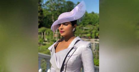 Priyanka Chopra sports chic dress suit at royal wedding
