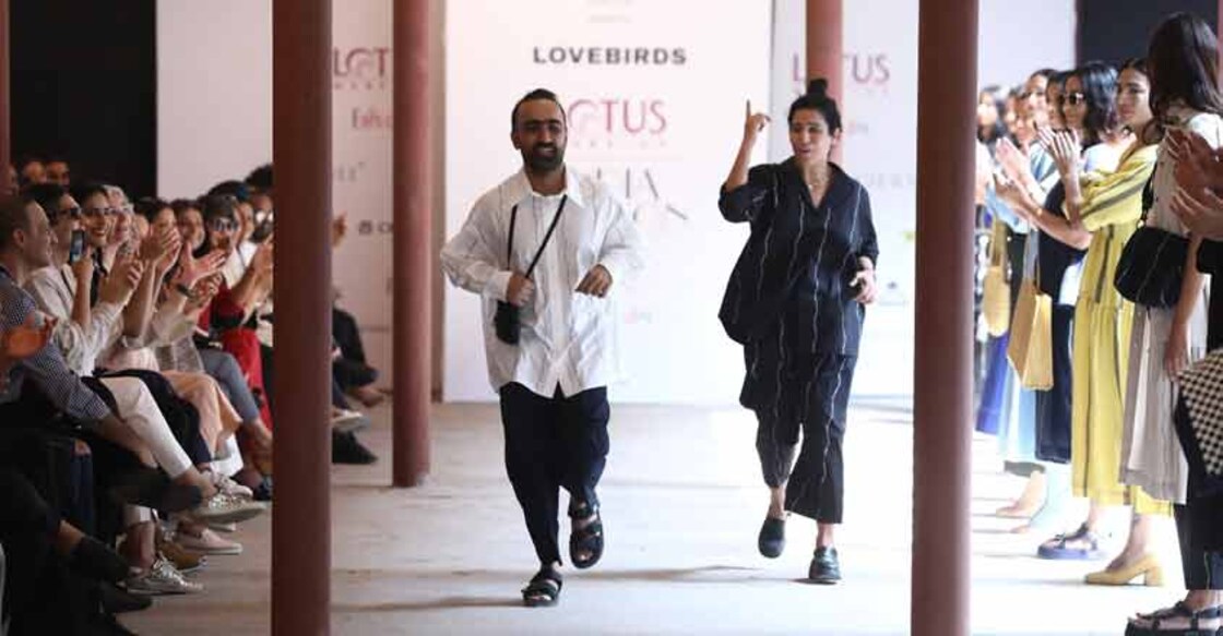 New Delhi: Fashion designers Gursi and Amrita Khanna get applause from the audience and the models who showcased the collection of their fashion label Lovebirds on the fourth day of Lotus Make-up India Fashion Week, in New Delhi on Oct 12, 2019. (Photo: IANS)