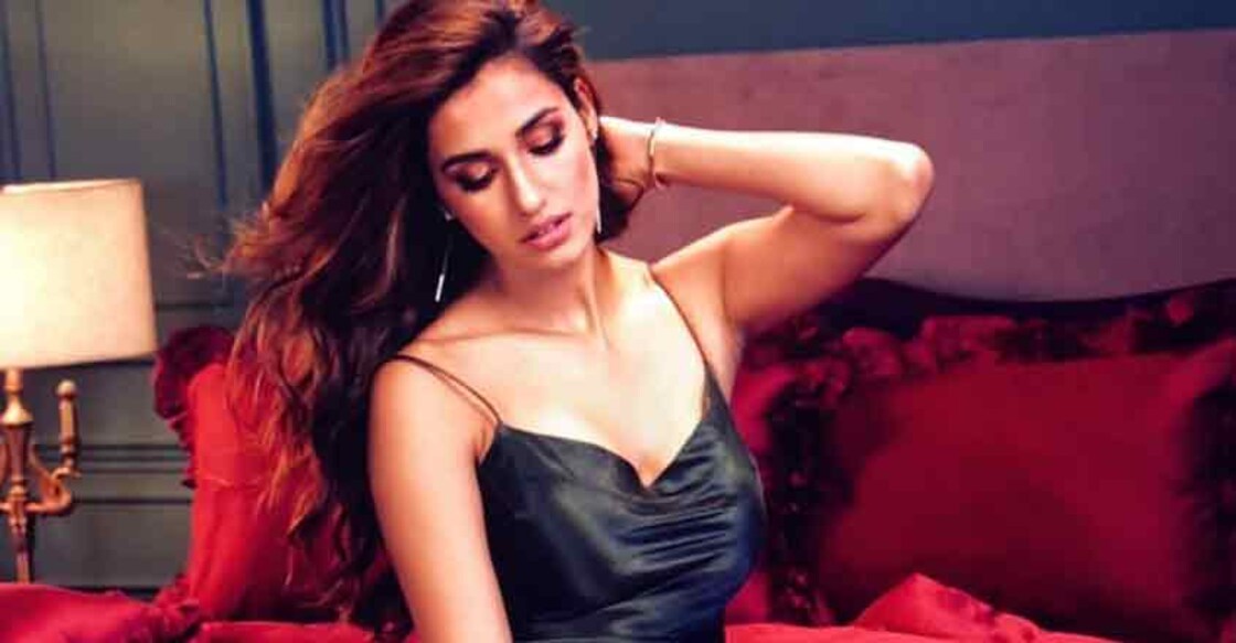 Actress Disha Patani raises the temperature whenever she shares her photos of working out or just posing by a pool in a bikini. Her fans think she is hot, but she begs to differ.