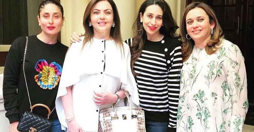 Pictures of Reliance Foundation Chairperson Nita Ambani's over 200-diamond encrusted Hermès Himalaya Birkin bag, worth over Rs 2.6 crore, has gone viral on the social media. In the images posted on the social media, Nita Ambani is seen wearing a white ensemble and carrying the Hermès Himalaya Birkin Bag. Bollywood divas Karisma Kapoor and Kareena Kapoor Khan are also seen in the photograph. Pictures of Reliance Foundation Chairperson Nita Ambani's over 200-diamond encrusted Hermès Himalaya Birkin bag, worth over Rs 2.6 crore, has gone viral on the social media. In the images posted on the social media, Nita Ambani is seen wearing a white ensemble and carrying the Hermès Himalaya Birkin Bag. Bollywood divas Karisma Kapoor and Kareena Kapoor Khan are also seen in the photograph.