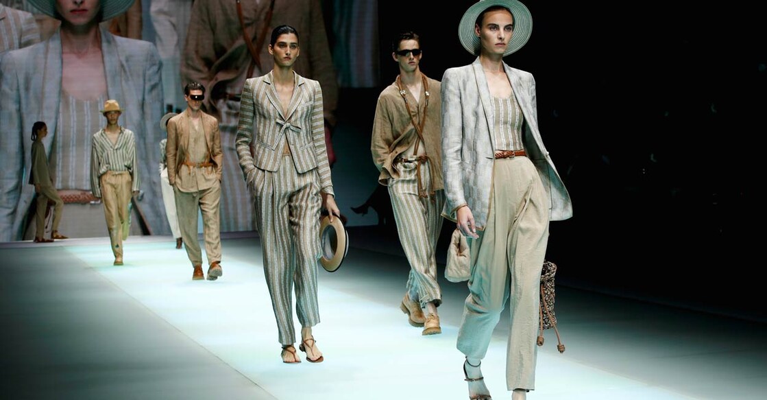 Models present creations from the Emporio Armani Spring/Summer 2022 collection during Milan Fashion Week in Milan, Italy. Image courtesy: Reuters/Alessandro Garofalo