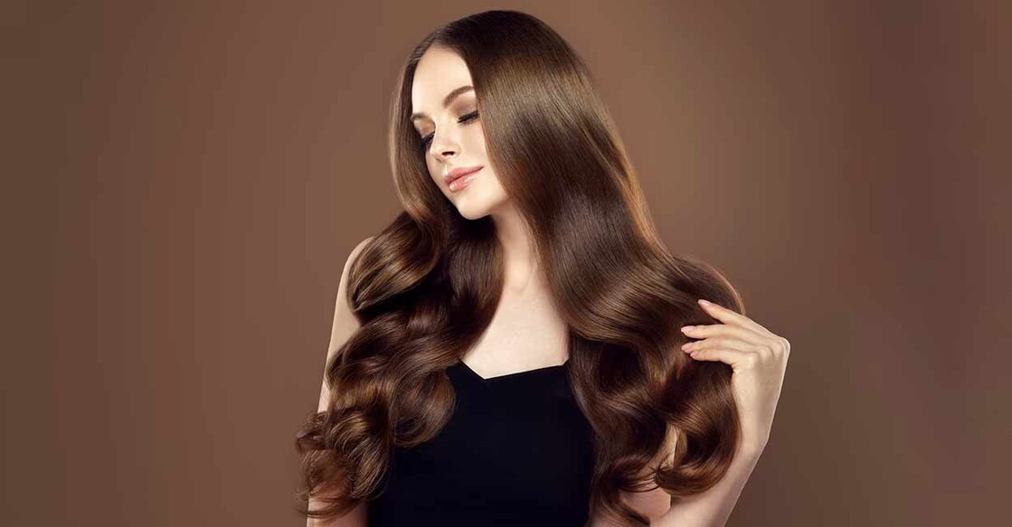 Hair needs moisture to remain silky and avoid frizziness. Photo: Sofia Zhuravets/istockphoto.com