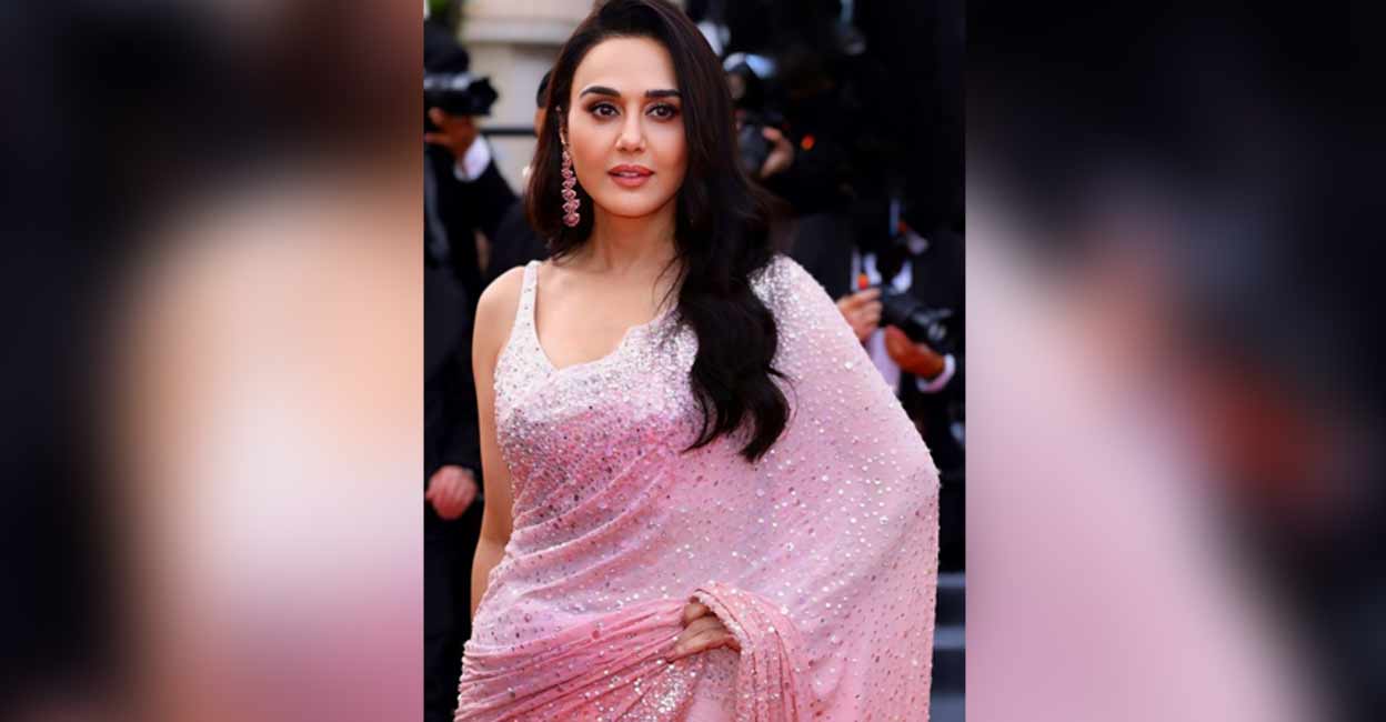 preity-zinta-c Preity Zinta wore a subtle pink sari at Cannes. Photo: IANS