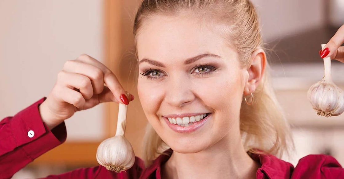 Garlic-based remedies can be effective in checking acne. Photo Credit: Anetlanda/istockphoto.com