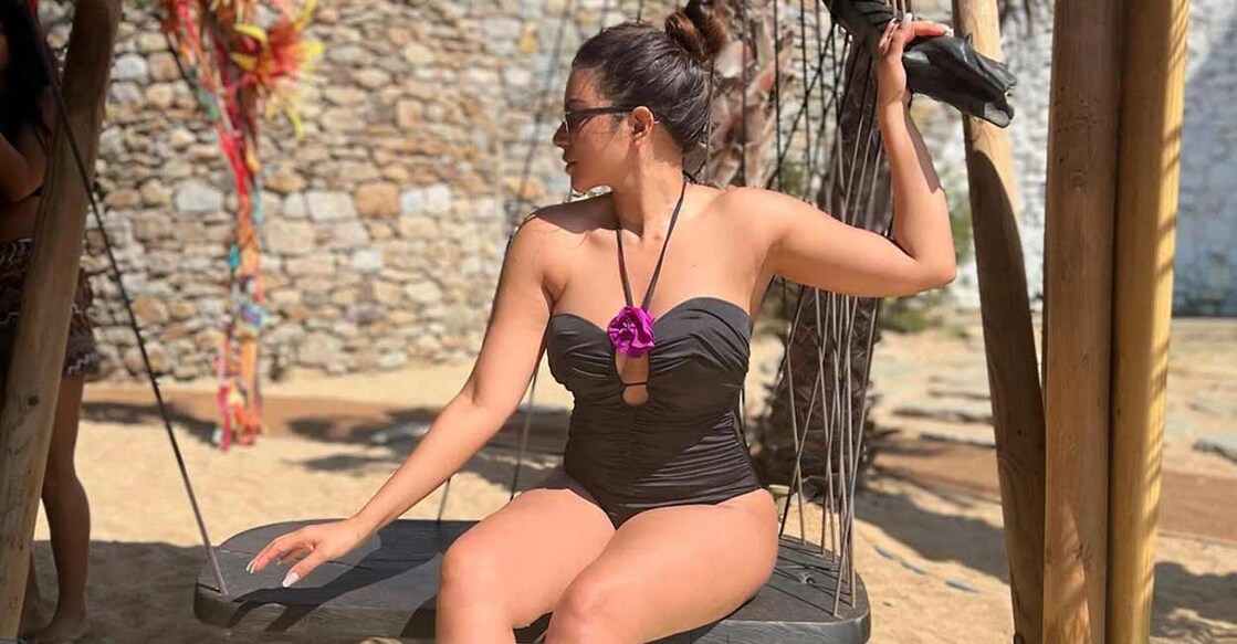 Shama Sikander appeared in a halter neck swimsuit, featuring a purple rosette neckline design. Photo: instagram.com/shamasikander
