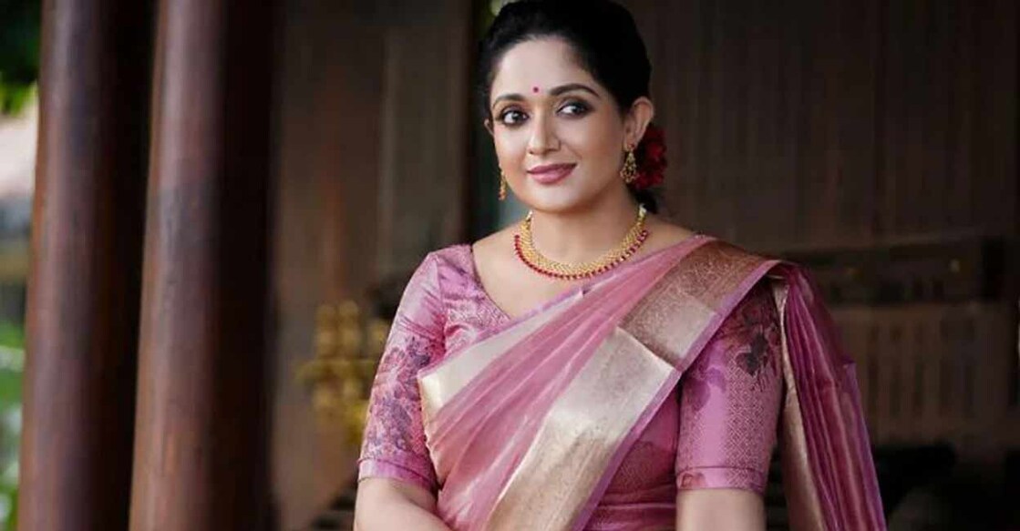 Kavya's outfit is a Kanchipuram silk plain kasavu sari in onion pink. kavyamadhavanofficial/Instagram