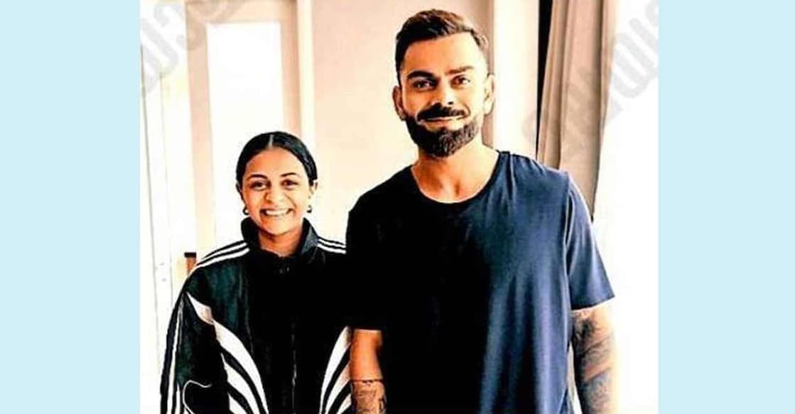 Pushpa Mathew with Virat Koli. Photo: Special arrangement