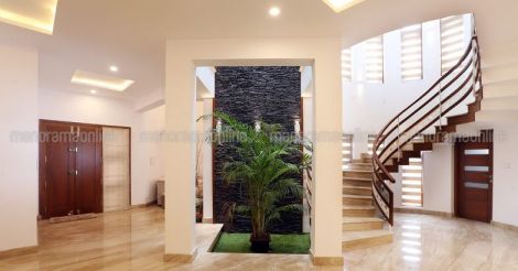 Charming exteriors and chic interiors: A 2,500 sq ft Thalassery house