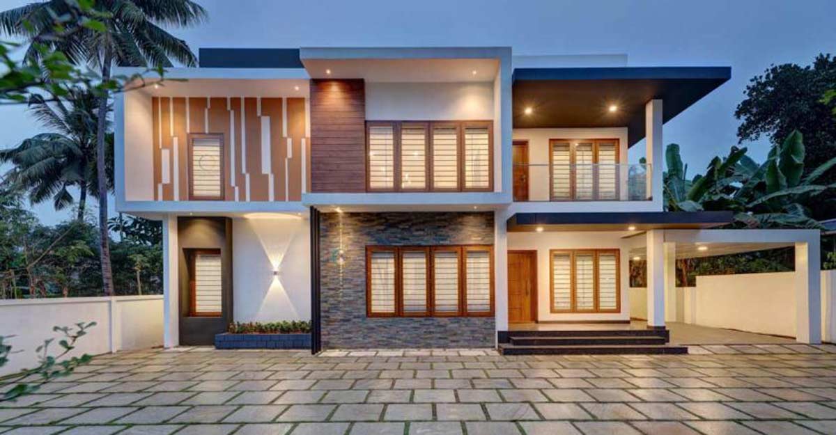 chalakkudy-house The exterior features the contemporary flat – box style.