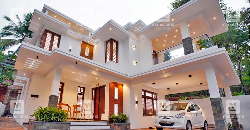 Classy features and vast interiors make this Calicut house a vision in ...