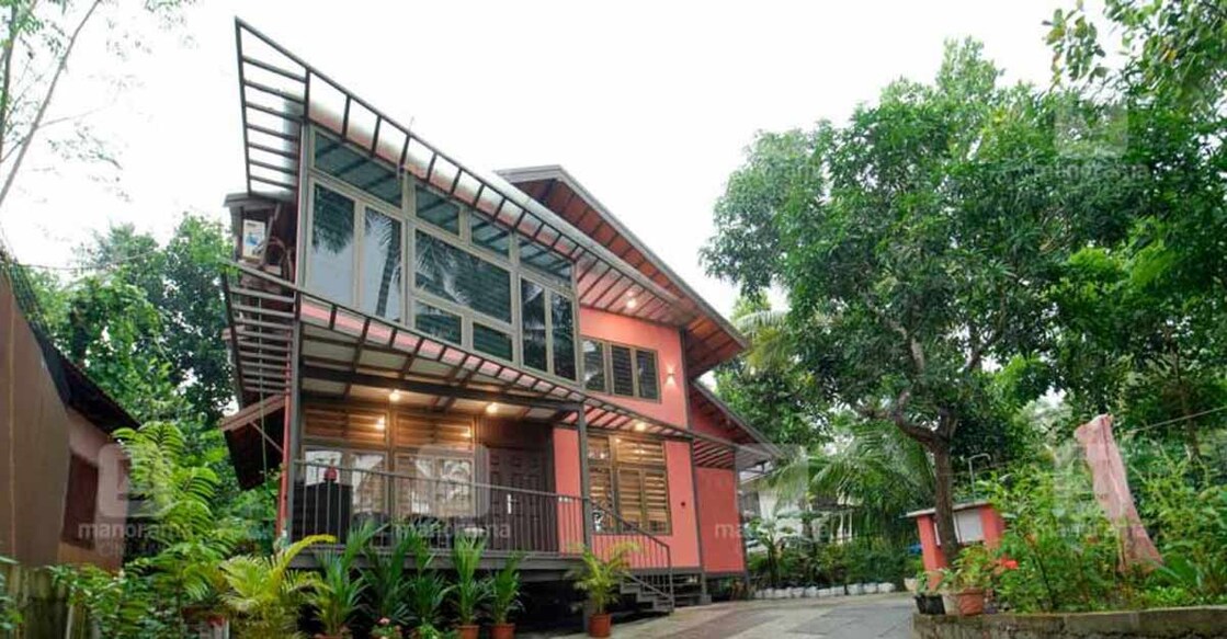 This sturdy, durable Kozhikode house in fibre cement boards is a spectacle