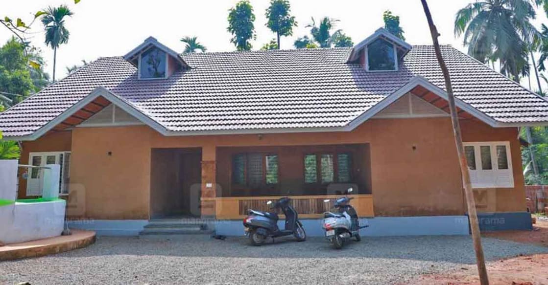Even though the house looks like a single storey structure from outside, the facilities of double storey has been included inside. 