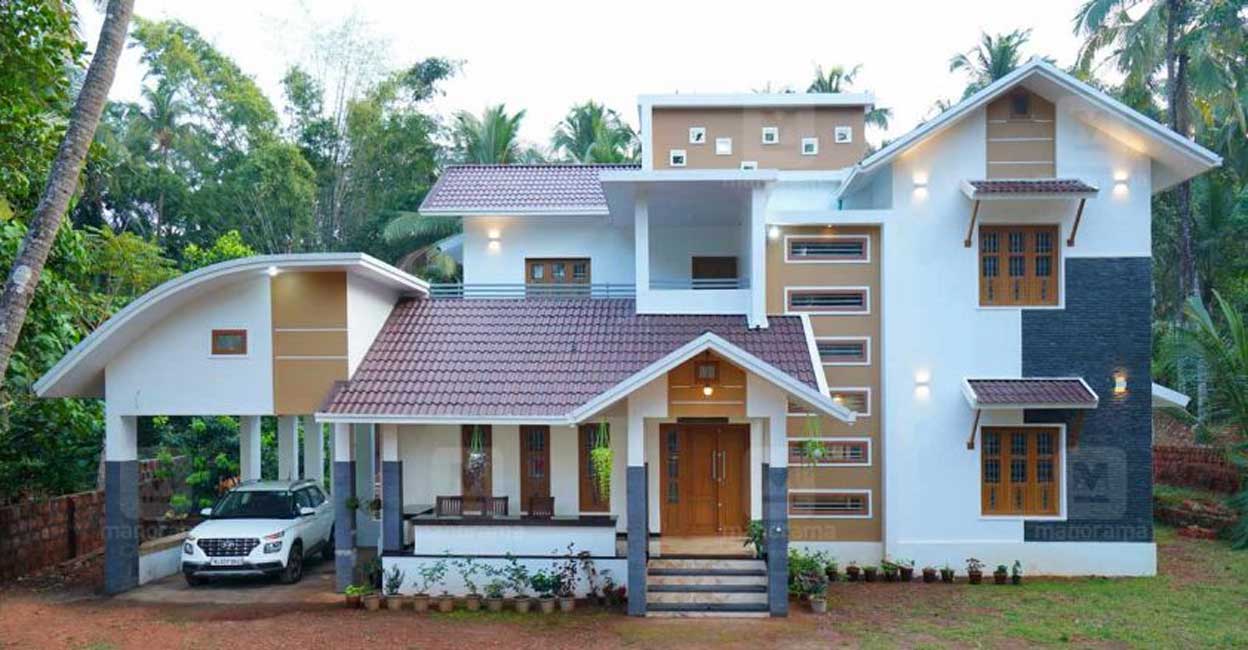 The splendid roof that features a unique blend of flat, curve and slope designs and the attractive colour palette are the highlights of the elevation.