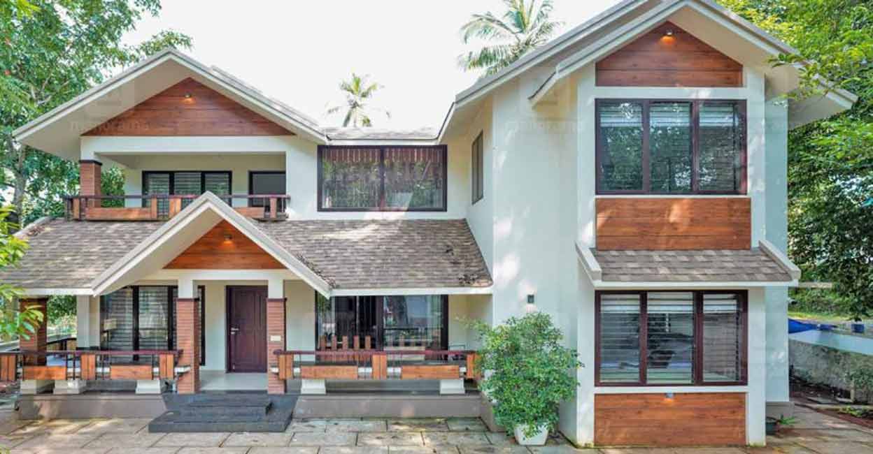 The sloped roof gives a traditional and tropical look to the elevation.