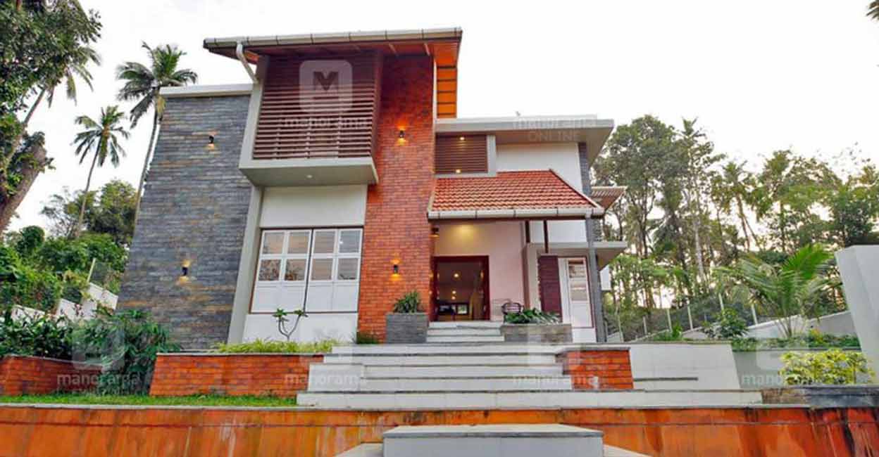 The classy elegance of terracotta stone cladding and kota stones is the highlight of the elevation.