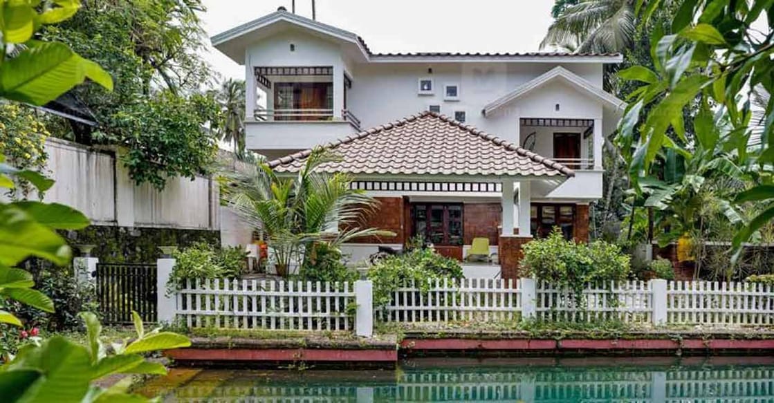 The house has been amazingly designed to open to the serene view of the pond. 