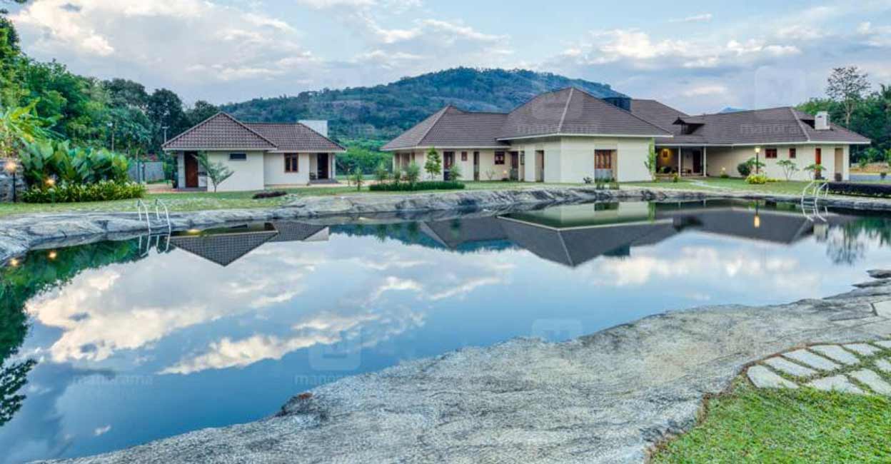 The slanting roof gives a touch of traditional grace to the elevation.