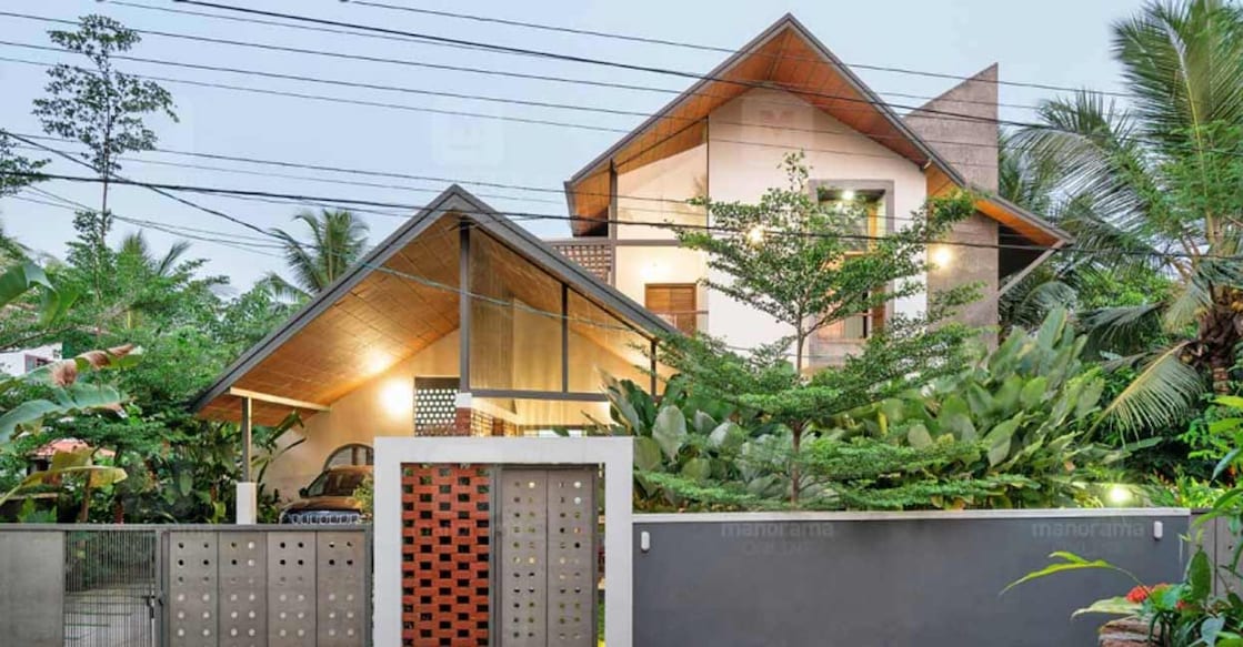 One of the most fascinating aspects of the house is the layered slope roofs that suit the tropical climate.