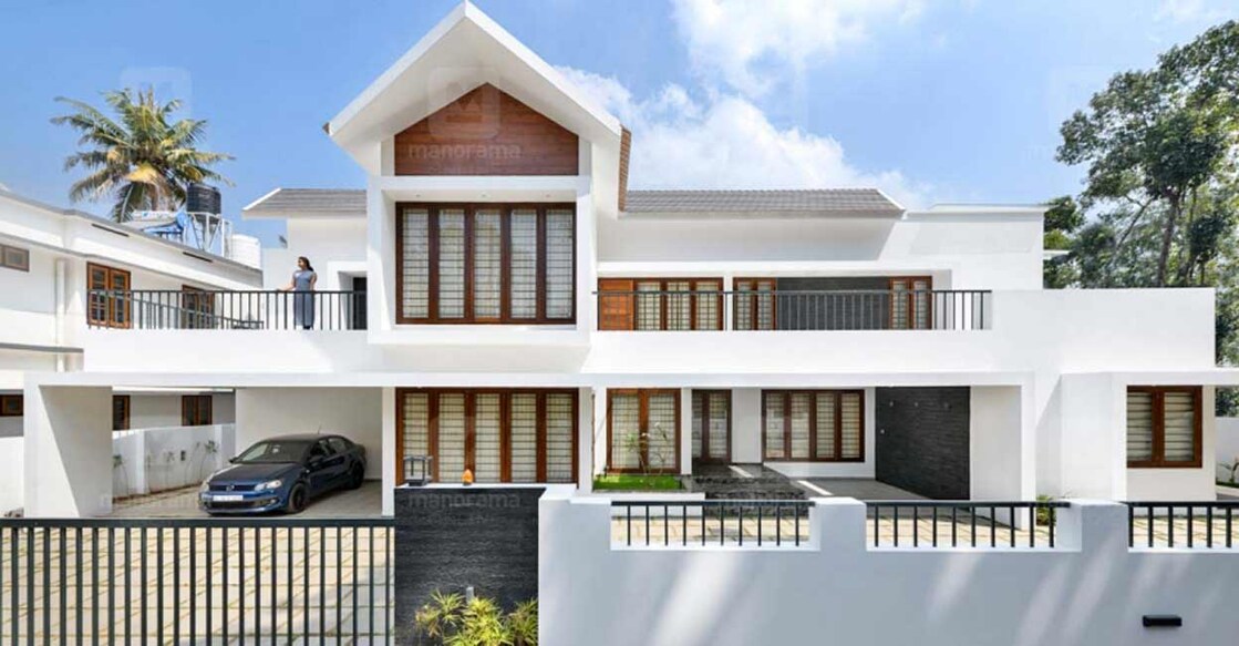 The modern contemporary architecture blends with classic slope roof on the elevation.