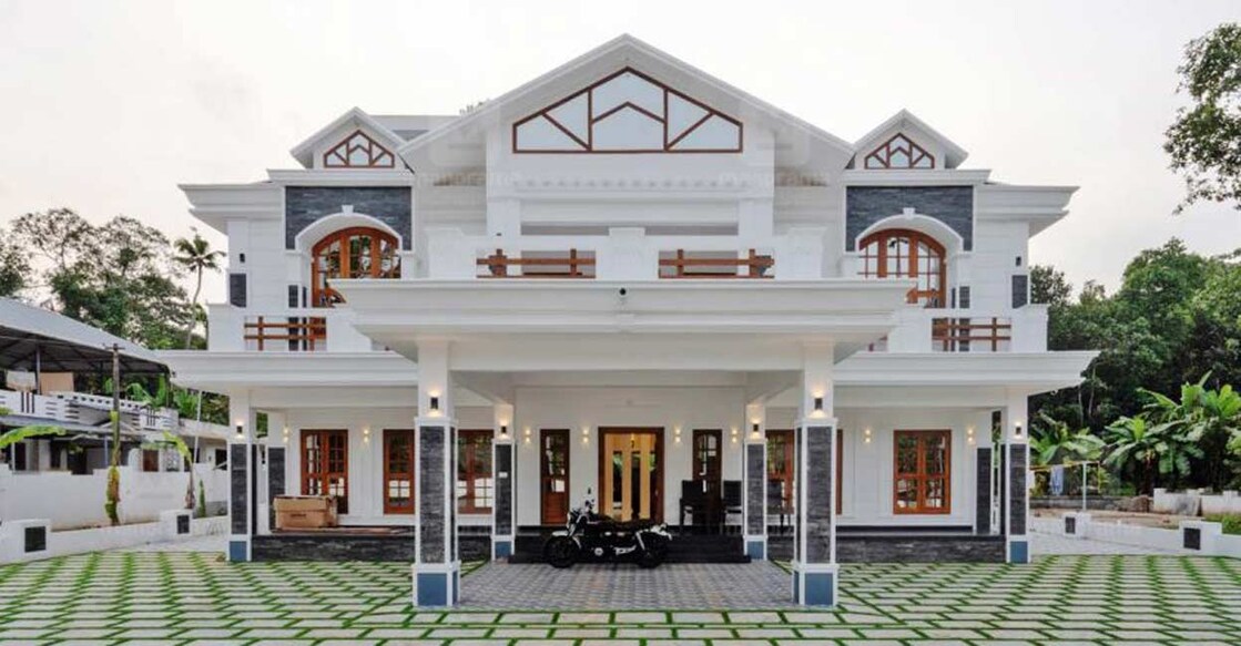 The elevation sports a fusion of both traditional and modern architectural styles.