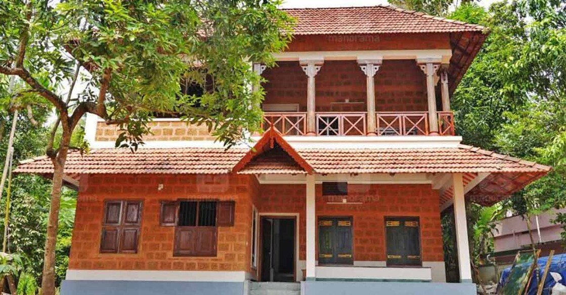 The elevation features an elegant traditional architectural style.