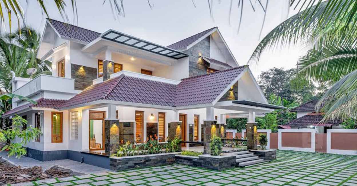 Impressive tropical designs grace this contemporary Edappal house