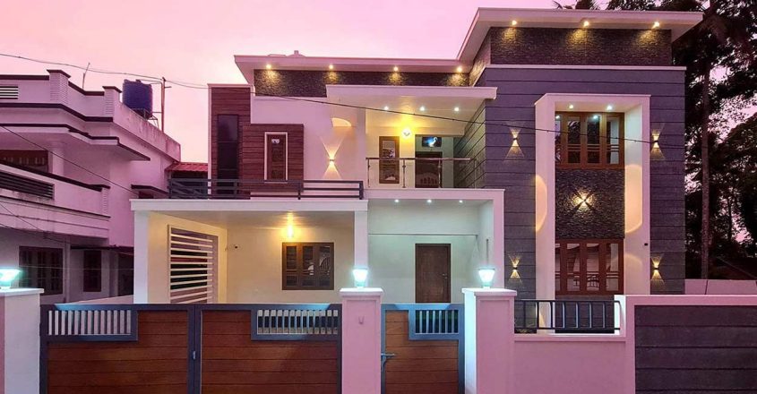 With box style elevation and interesting highlights, this Changanassery house is a winner