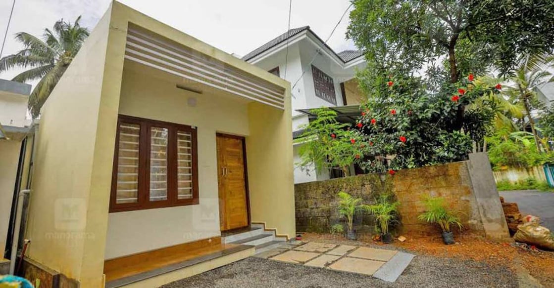 Thrissur house Reducing the area in square feet had played a vital role in limiting the construction cost of the house.