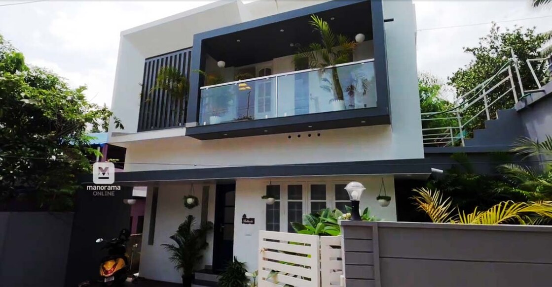 The elevation features simple yet elegant flat box style.