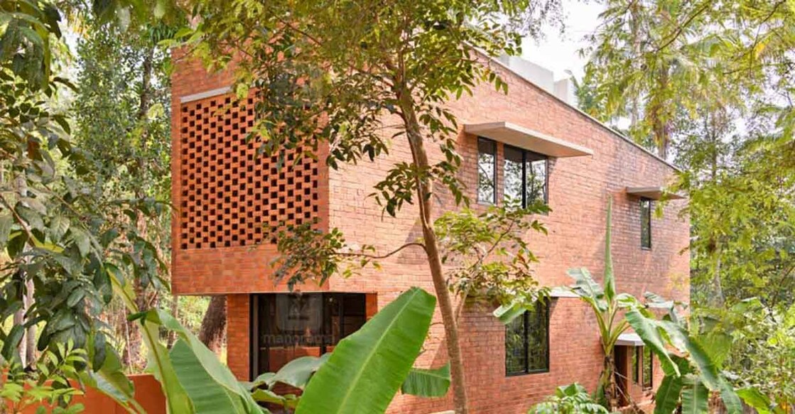 The elevation features the flat box style to suit the small plot.