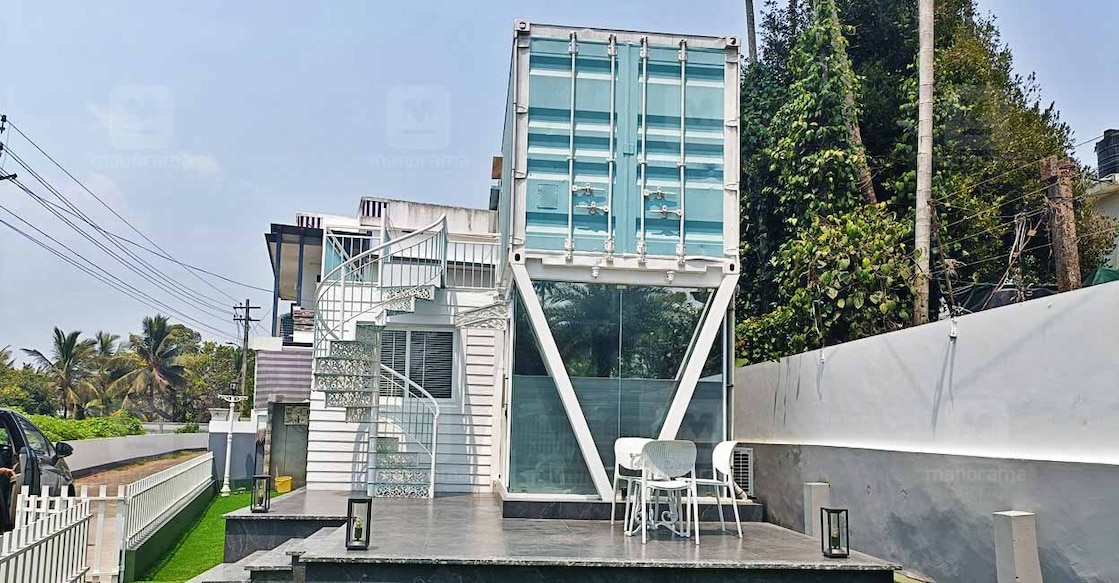 container-home-view The double story house in 800 sqft was built using three containers that is around twenty feet long and seven feet wide and tall.